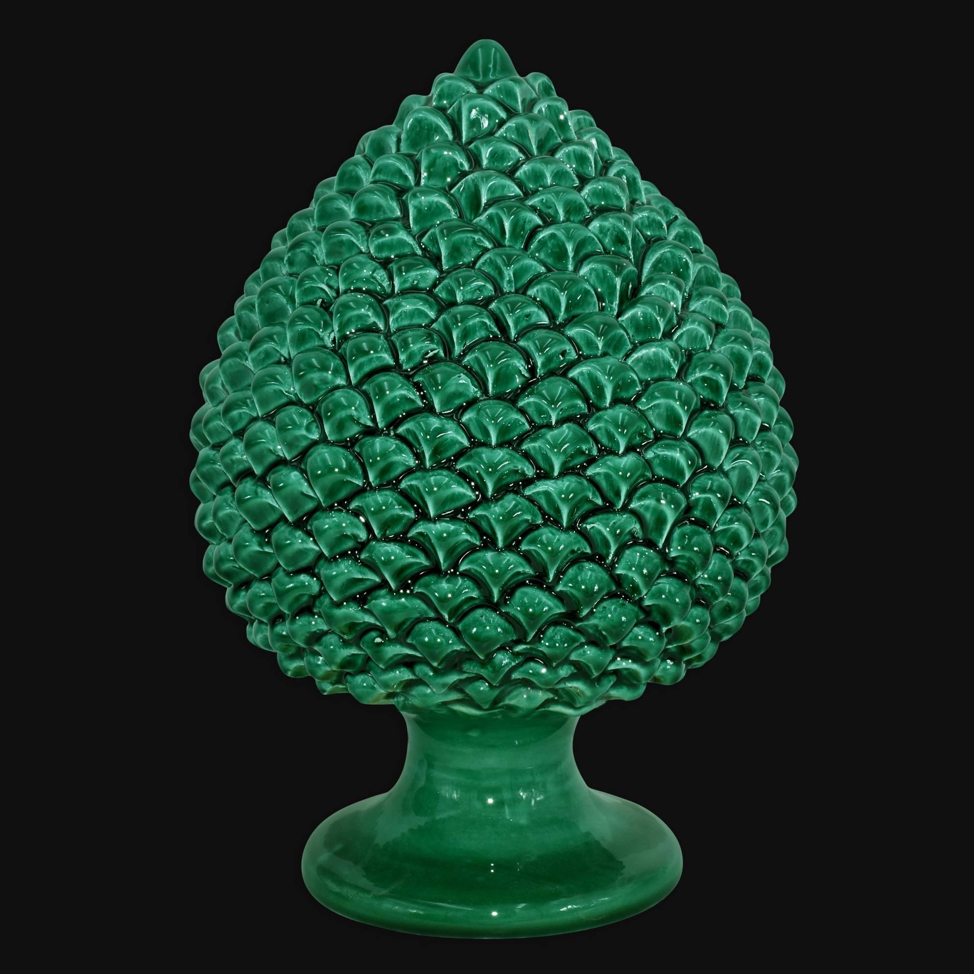 Ceramica di Caltagirone a forma di pigna, fatta a mano, verde brillante su sfondo nero
