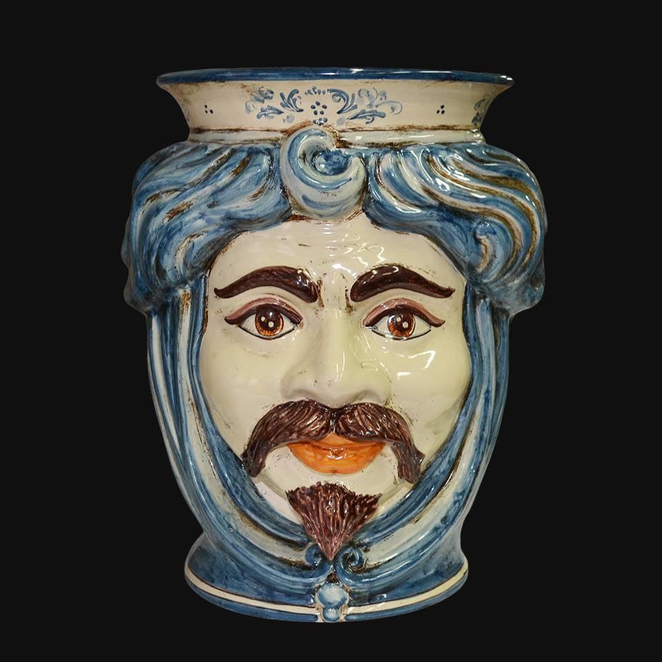 Ceramiche di Caltagirone fatti a mano con volto barbuto e capelli blu, arte tradizionale siciliana